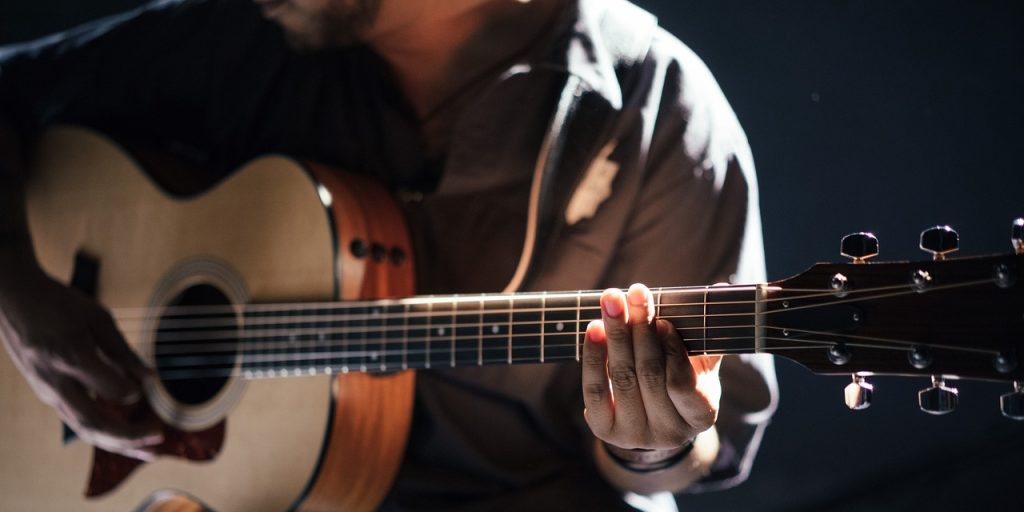 acoustic guitar guitarist 1851248